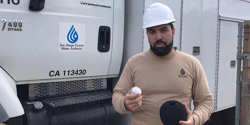 Water Resources Engineer Sami Sweis holds the Nautilus in his right hand and a foam ball in his left hand that the high-tech device is placed in before it is inserted into a water pipeline to scan for potential leaks. Photo: Water Authority