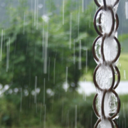 Using devices like this rain chain can help you slow and store rainfall for later use. Photo: Contraption/Flickr-Creative Commons License