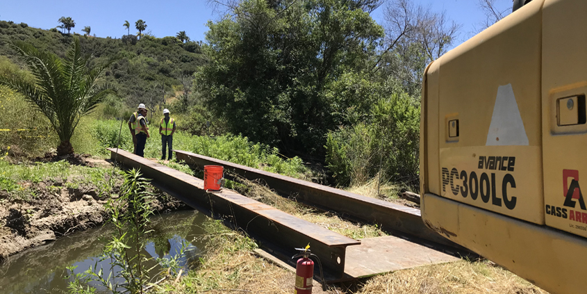 This temporary bridge allowed Vallecitos Water District crews to repair a manhole without affected sensitive habitat. Photo: Vallecitos Water District rehab manhole