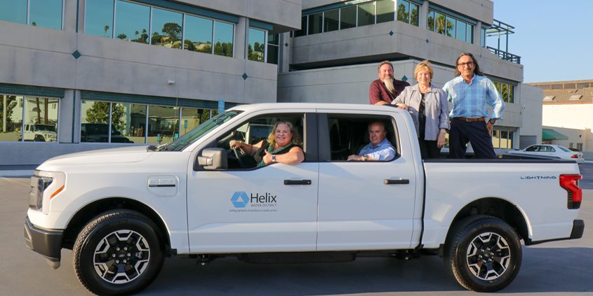 Helix Water District Board of Directors in the district’s new all-electric, zero-emission, Ford F-150 Lightning pickup truck. Driver’s seat: Board President Kathleen Coates Hedberg. Backseat: Director Dan McMillan. Back of the truck: Directors Joel Scalzitti, De Ana Verbeke and Mark Gracyk. Photo: Helix Water District sustainability