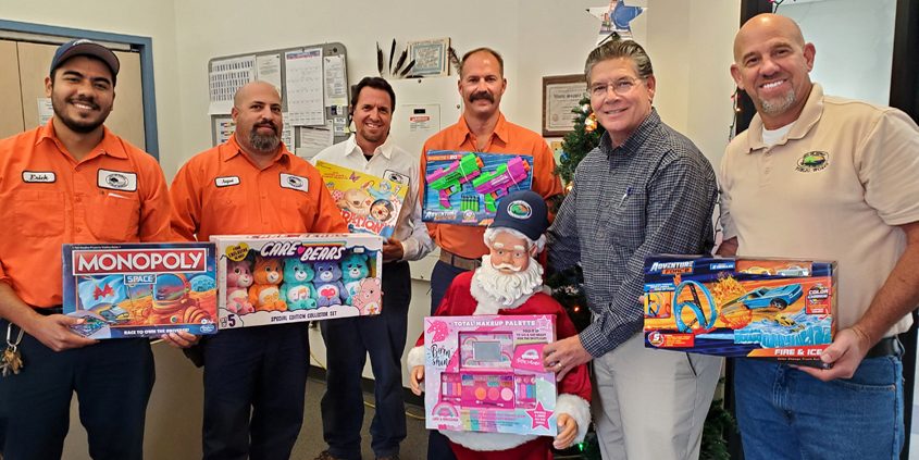 City of Poway staff including the Public Works Utilities (Water/Wastewater) Divisions provided toys and shoes for over 150 children in cooperation with the Kiwanis Club “Holiday with a Hero” event.(L to R): Erick Calderon, Amjad Mohamed, Barry Medlin, Randy Slusher, Terry Zaragoza, and Michael Devenere. Photo: City of Poway